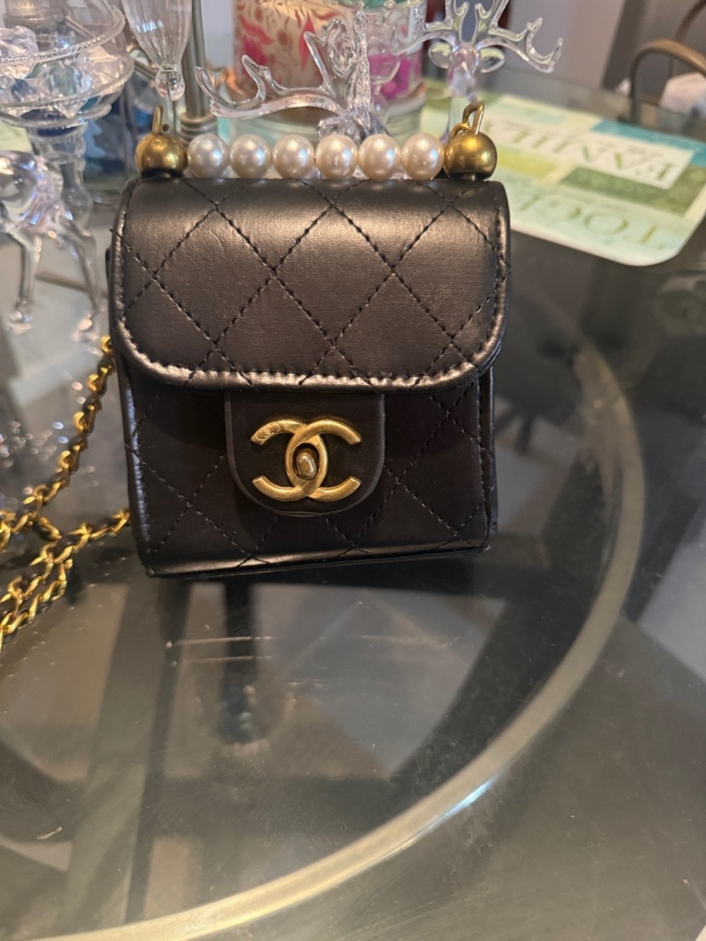 Black Quilted Mini Bag with Pearl Top Handle and Gold Chain